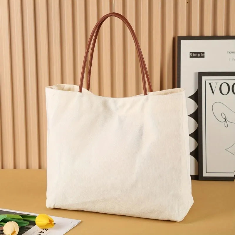Natural cotton canvas tote bag with double handles in a neutral colour