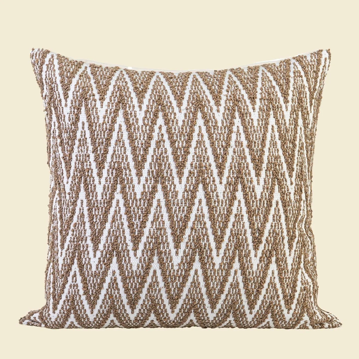 Chinese ancient style square pillow cushion in Maillard colours on a sofa.