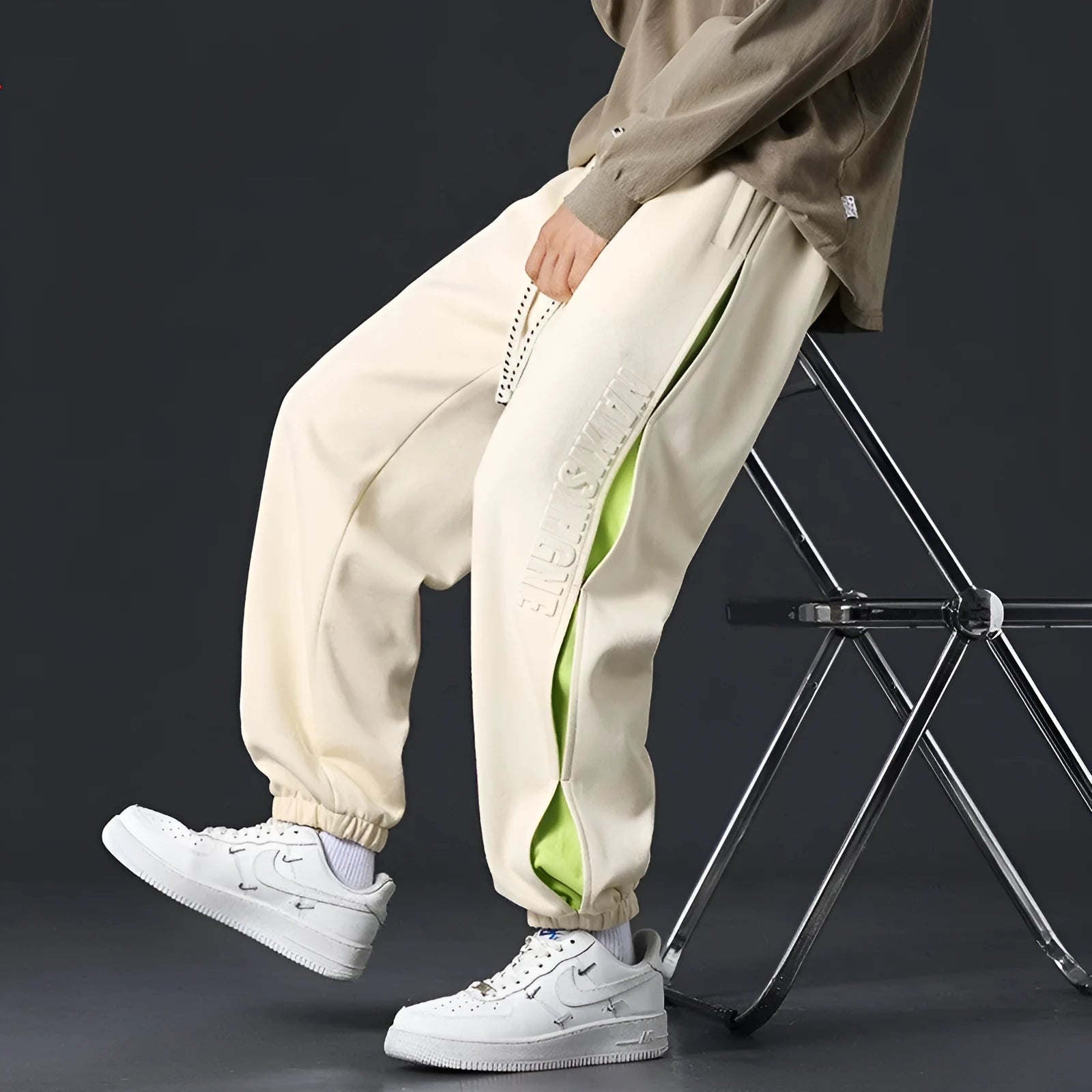 Men's loose-fit cotton trousers with ankle banded design in grey green colour