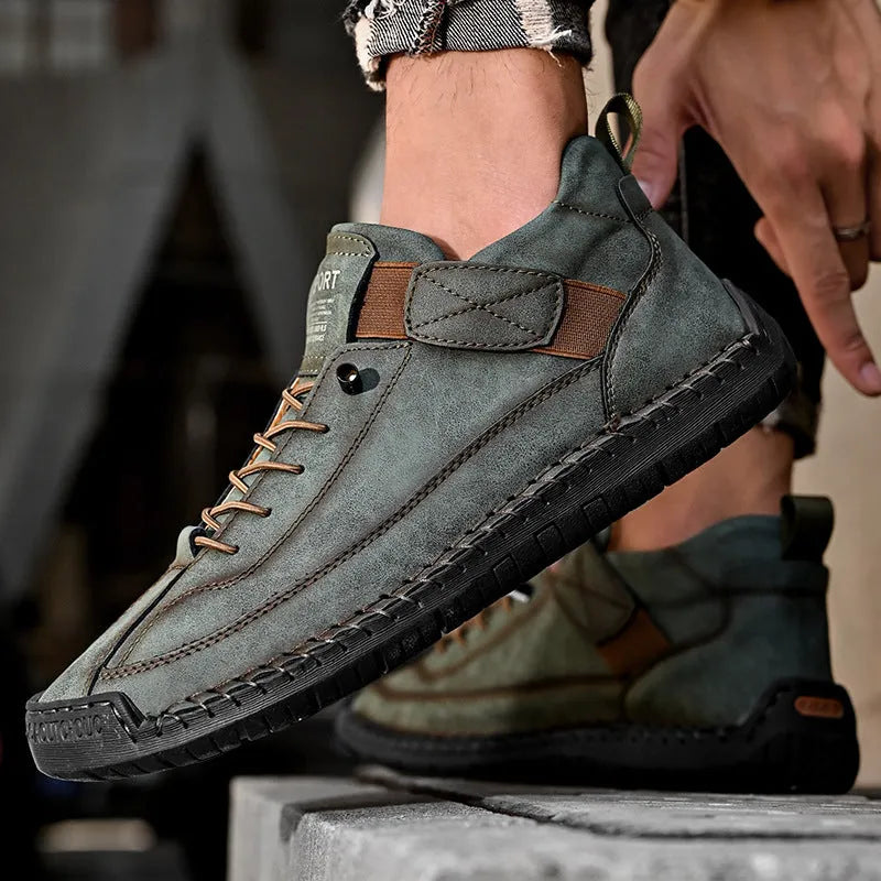Men's mid-top Martin boots with microfiber upper, leather lining, and rubber sole in solid colour options for winter outdoor wear.