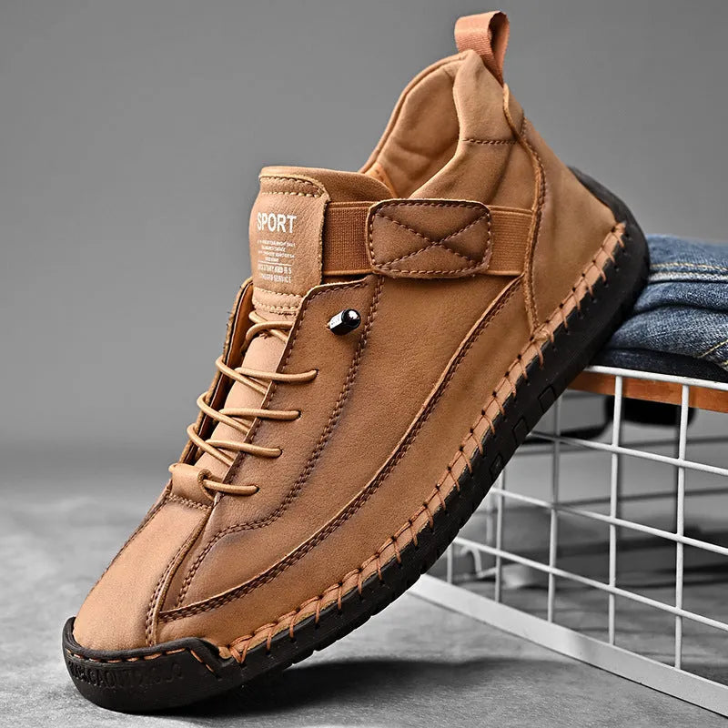 Men's mid-top Martin boots with microfiber upper, leather lining, and rubber sole in solid colour options for winter outdoor wear.