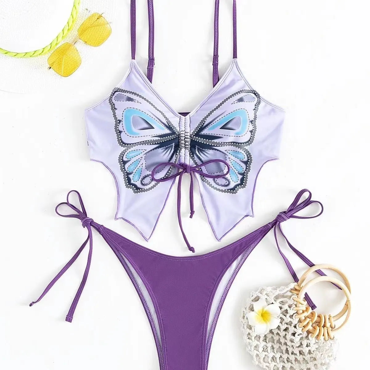 Women's purple bikini swimsuit with bow tie straps and European style briefs