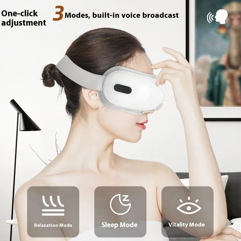 White rechargeable eye massager with hot compress and airbag massage functions for relieving eye fatigue