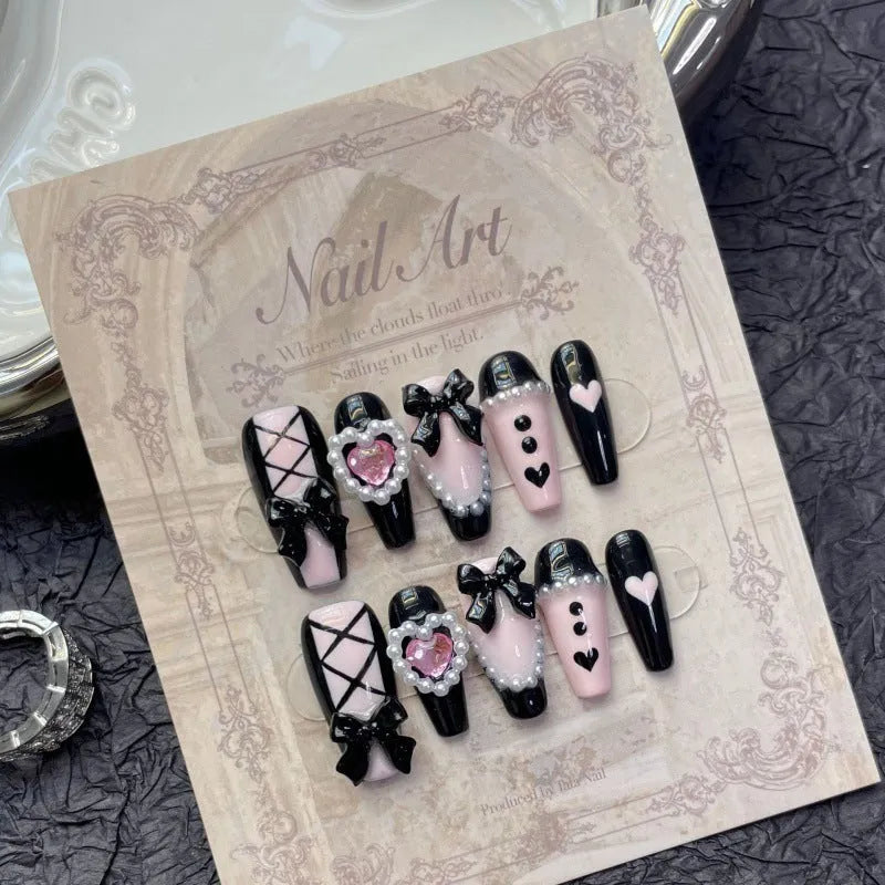 Black and peach heart hand-painted artificial nails with detachable adhesive in four sizes