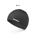 Silicone swimming cap with integrated waterproof earmuffs in multiple colours featuring a printed letter pattern.